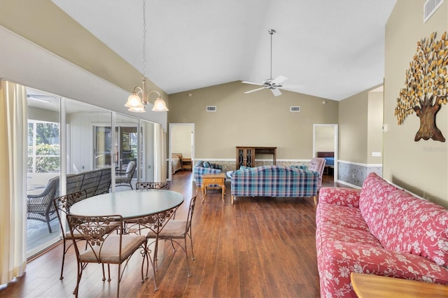 7472 Clearmeadow Dr, Spring Hill, FL 34606 - dining area with vaulted ceiling, visible vents, ceiling fan with notable chandelier, and dark wood-style flooring