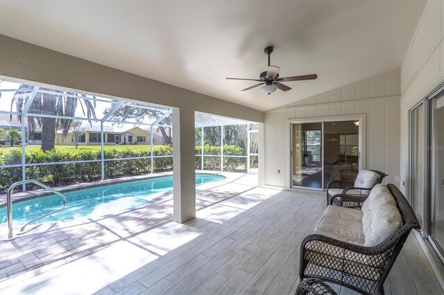 7472 Clearmeadow Dr, Spring Hill, FL 34606 - pool with glass enclosure, a patio, and a ceiling fan