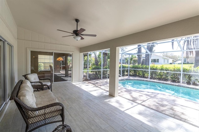 7472 Clearmeadow Dr, Spring Hill, FL 34606 - pool with glass enclosure, a patio, and a ceiling fan