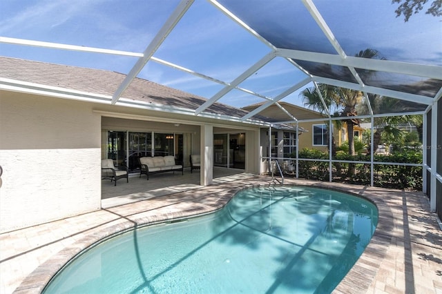 7472 Clearmeadow Dr, Spring Hill, FL 34606 - outdoor pool featuring an outdoor living space, glass enclosure, and a patio