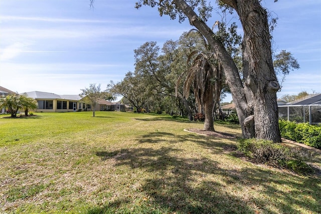 7472 Clearmeadow Dr, Spring Hill, FL 34606 - view of yard featuring glass enclosure