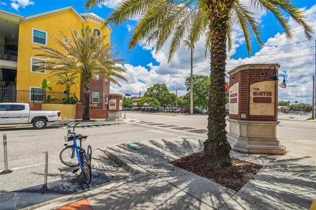 1810 E Palm Ave Unit 6104, Tampa, FL 33605 - view of asphalt street featuring street lighting, curbs, and sidewalks