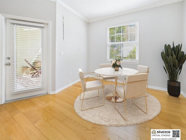 1810 E Palm Ave Unit 6104, Tampa, FL 33605 - dining space with ornamental molding, wood finished floors, and baseboards