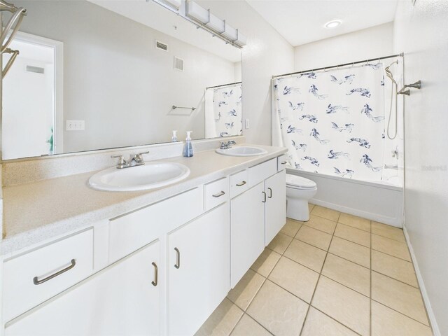 1810 E Palm Ave Unit 6104, Tampa, FL 33605 - bathroom with toilet, double vanity, tile patterned floors, and shower / tub combo
