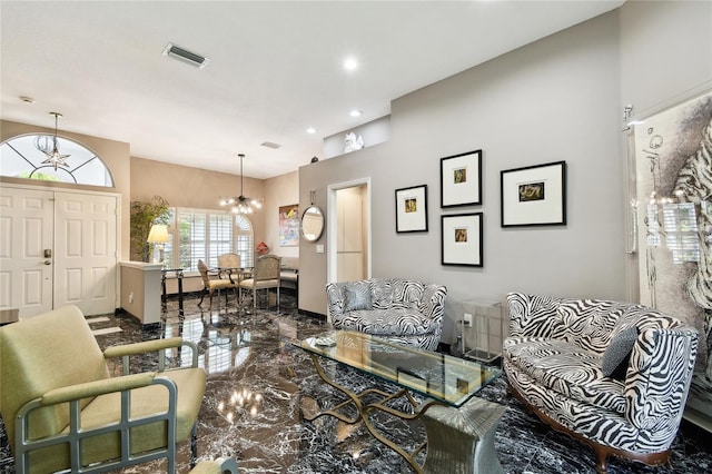 441 Village Dr, Tarpon Springs, FL 34689 - living room featuring marble tiled floors, a chandelier, and recessed lighting