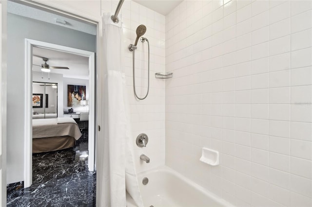441 Village Dr, Tarpon Springs, FL 34689 - ensuite bathroom with shower / bath combo, a ceiling fan, and marble finish floors