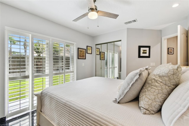 441 Village Dr, Tarpon Springs, FL 34689 - bedroom with a closet and ceiling fan