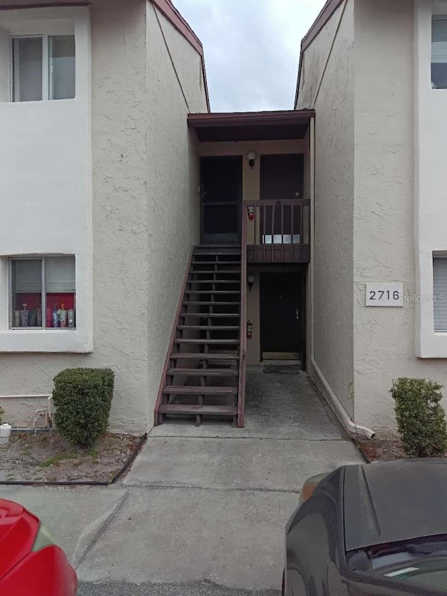 view of property with stairway