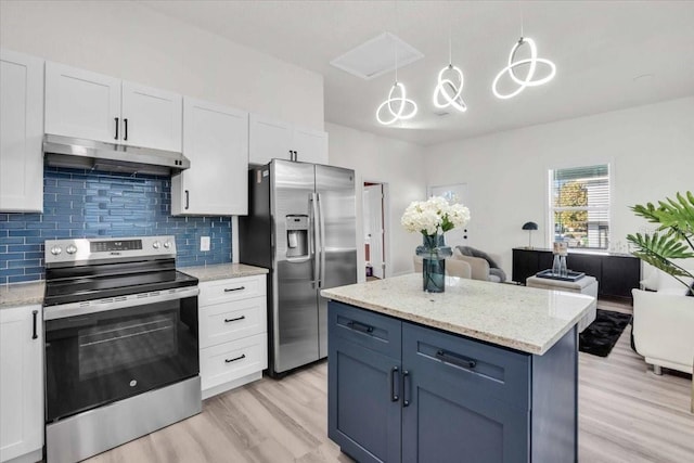 3101 N 15th St, Tampa, FL 33605 - kitchen featuring under cabinet range hood, stainless steel appliances, and white cabinetry