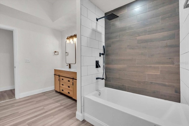 3101 N 15th St, Tampa, FL 33605 - full bathroom with baseboards, vanity, wood finished floors, and  shower combination