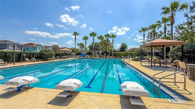 pool featuring a patio