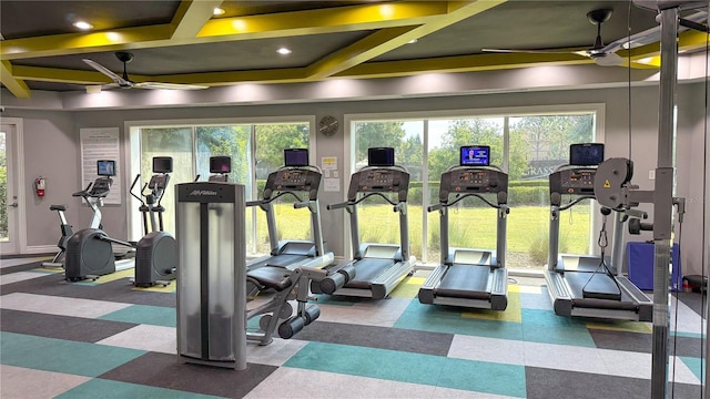 gym with coffered ceiling, a ceiling fan, tile patterned floors, and recessed lighting
