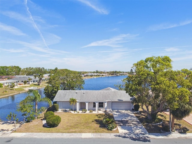 drone / aerial view featuring a water view