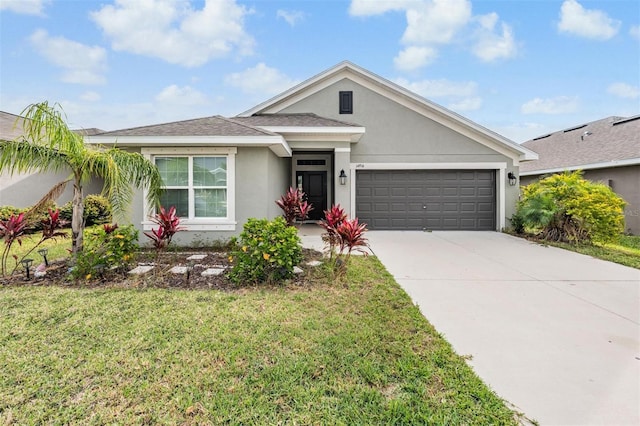 ranch-style home with stucco siding, concrete driveway, a garage, and a front yard