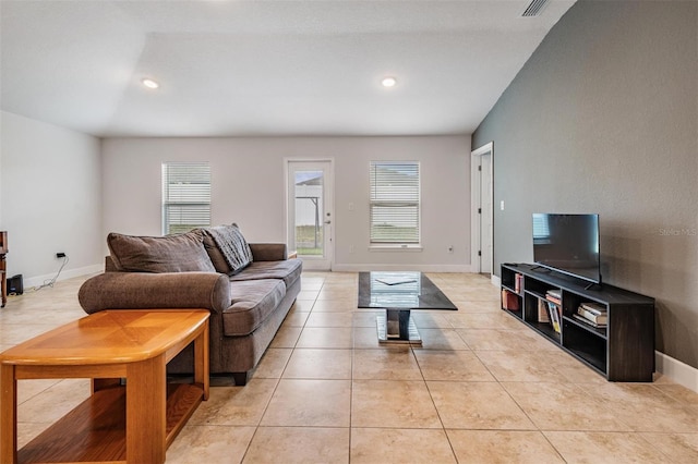 living area featuring recessed lighting, visible vents, baseboards, and light tile patterned flooring