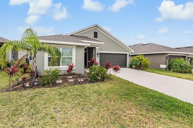 single story home with stucco siding, a front yard, concrete driveway, and an attached garage