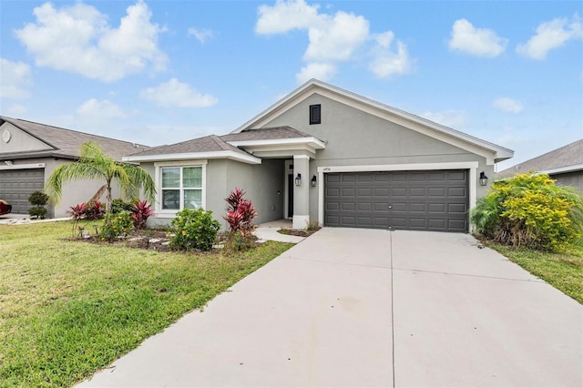 view of front facade with stucco siding, a garage, concrete driveway, and a front lawn
