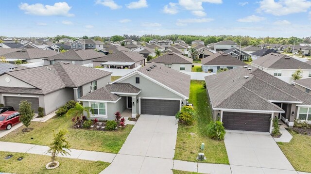 drone / aerial view with a residential view