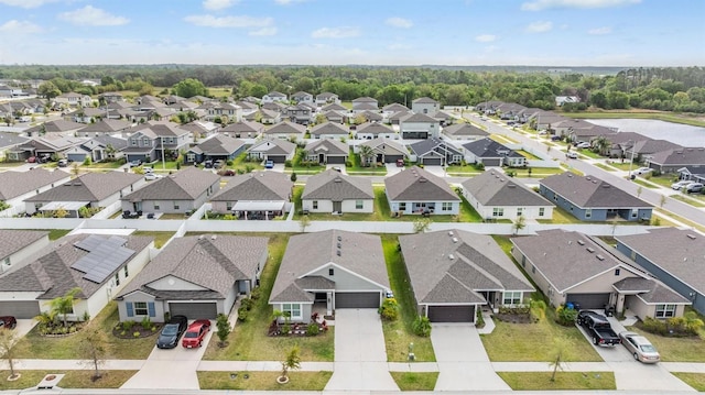 drone / aerial view with a residential view