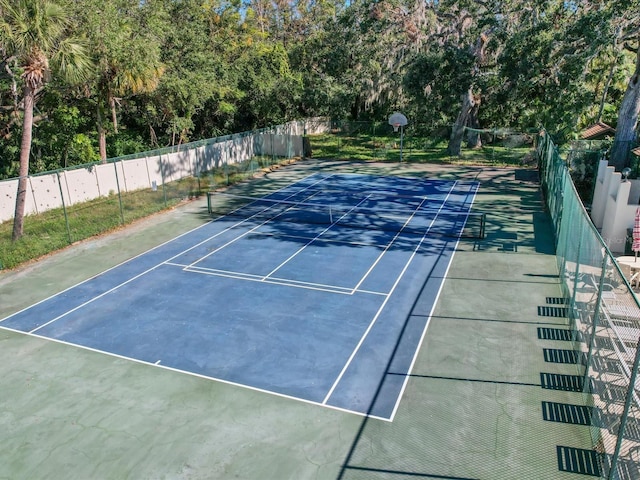 view of sport court featuring community basketball court and fence