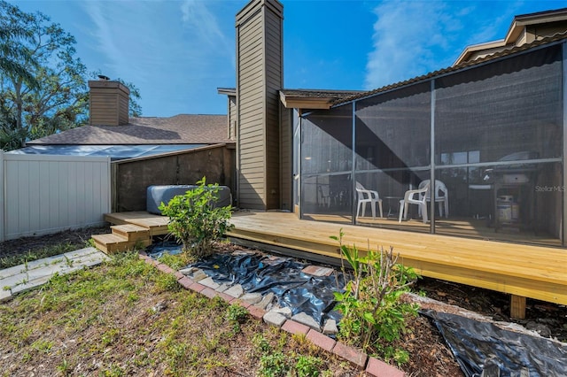 view of yard with fence and a wooden deck