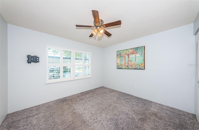 9214 Mission Oaks Blvd, Seminole, FL 33776 - carpeted empty room featuring ceiling fan