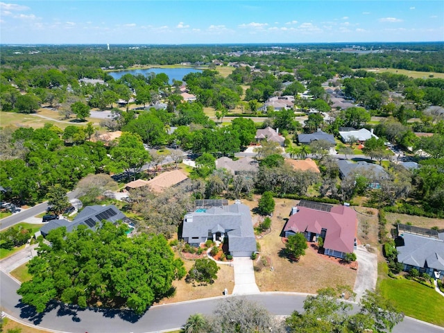aerial view featuring a water view and a residential view