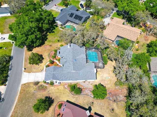 birds eye view of property with a residential view
