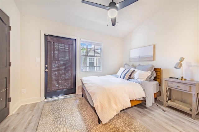 506 S Willow Ave Unit 7, Tampa, FL 33606 - bedroom with baseboards, wood finished floors, a ceiling fan, and vaulted ceiling