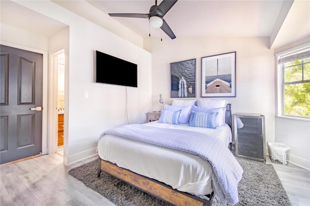 506 S Willow Ave Unit 7, Tampa, FL 33606 - bedroom featuring a ceiling fan, lofted ceiling, wood finished floors, and baseboards