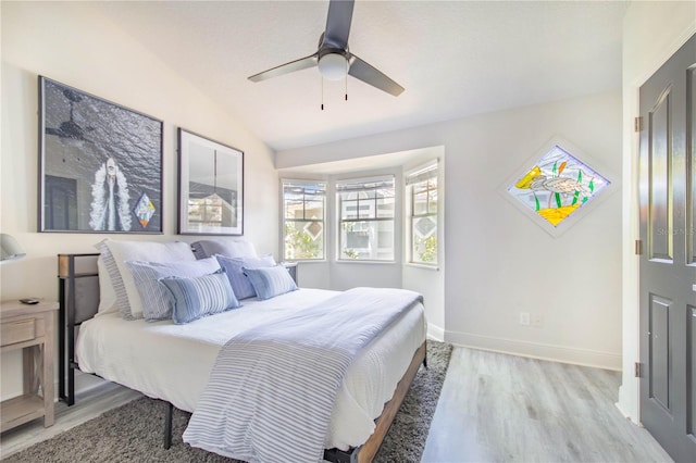 506 S Willow Ave Unit 7, Tampa, FL 33606 - bedroom featuring light wood-type flooring, lofted ceiling, baseboards, and ceiling fan