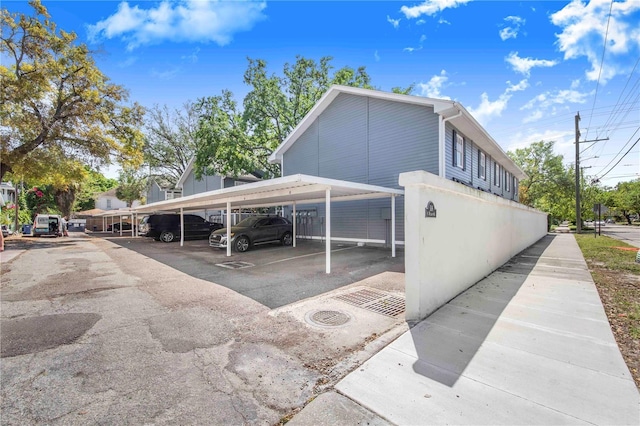 506 S Willow Ave Unit 7, Tampa, FL 33606 - view of side of home featuring covered parking