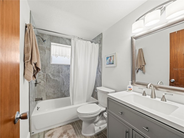 full bath featuring shower / tub combo with curtain, vanity, and toilet