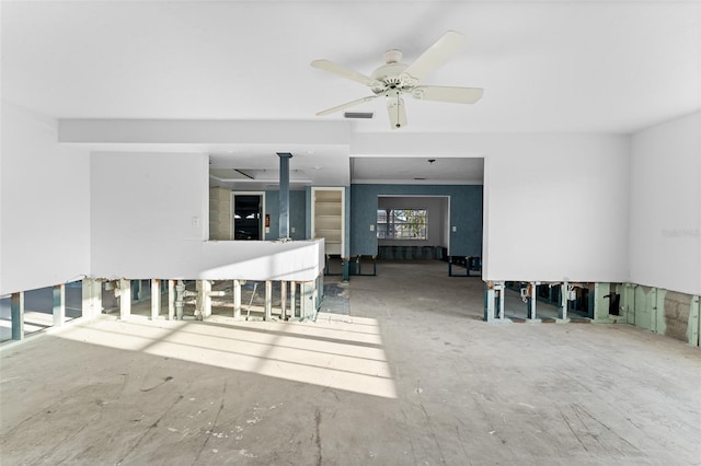 interior space featuring visible vents and ceiling fan
