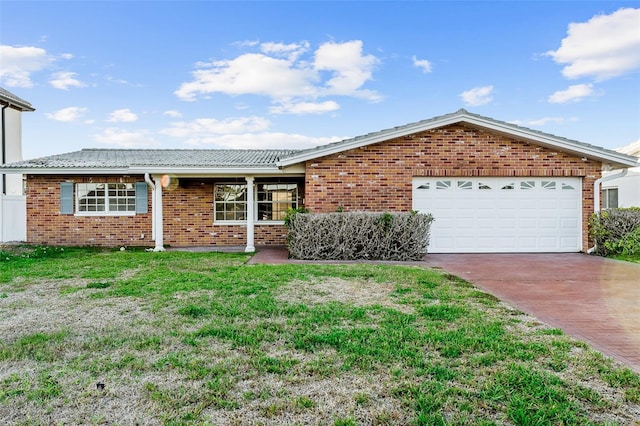 ranch-style house featuring concrete driveway, an attached garage, brick siding, and a front lawn
