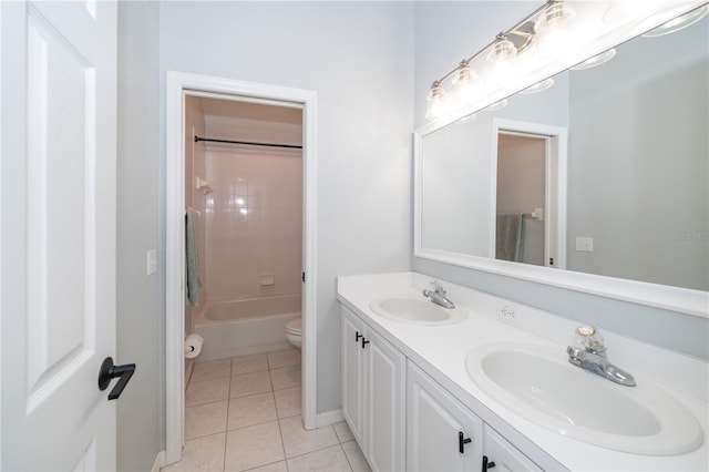 2206 Green Oaks Ln, Tampa, FL 33612 - full bath featuring toilet, a sink, double vanity, and tile patterned flooring