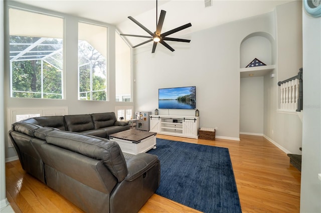2206 Green Oaks Ln, Tampa, FL 33612 - living room featuring baseboards, visible vents, light wood-style flooring, and ceiling fan