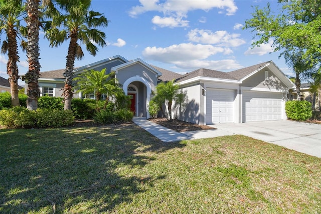 12304 Silton Peace Dr, Riverview, FL 33579 - view of front facade with stucco siding, driveway, a front yard, and an attached garage