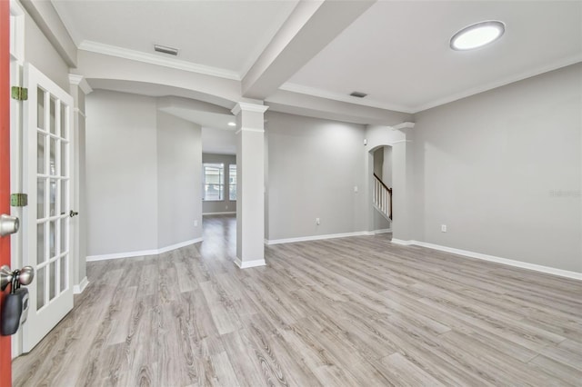 12304 Silton Peace Dr, Riverview, FL 33579 - interior space with visible vents, ornamental molding, decorative columns, wood finished floors, and arched walkways