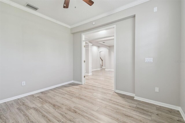12304 Silton Peace Dr, Riverview, FL 33579 - empty room featuring baseboards, visible vents, light wood-style flooring, ornamental molding, and ceiling fan
