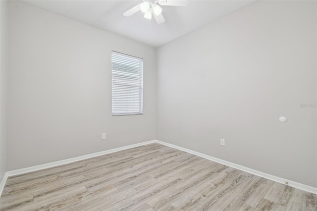 12304 Silton Peace Dr, Riverview, FL 33579 - unfurnished room with light wood finished floors, ceiling fan, and baseboards