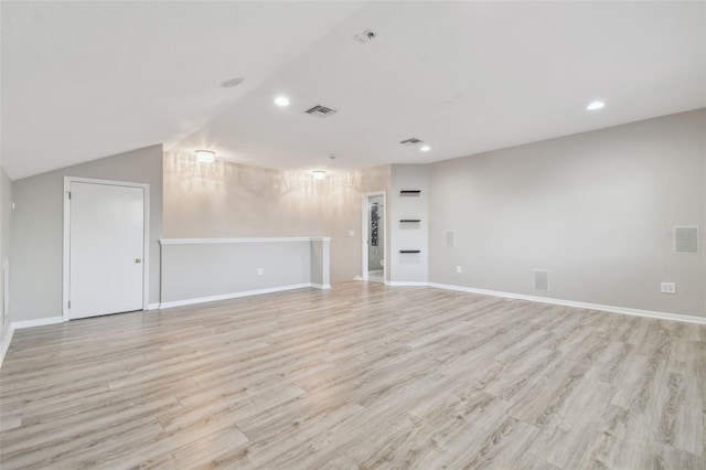 12304 Silton Peace Dr, Riverview, FL 33579 - unfurnished living room featuring visible vents, recessed lighting, baseboards, and light wood-style floors