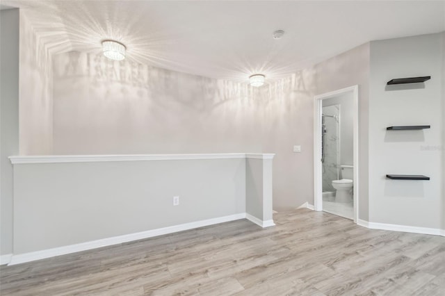12304 Silton Peace Dr, Riverview, FL 33579 - unfurnished room with wood finished floors and baseboards