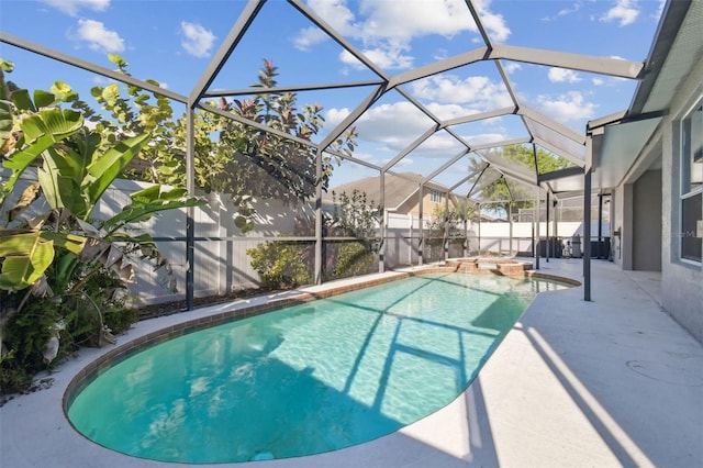 12304 Silton Peace Dr, Riverview, FL 33579 - view of swimming pool with a lanai, fence, a pool with connected hot tub, and a patio