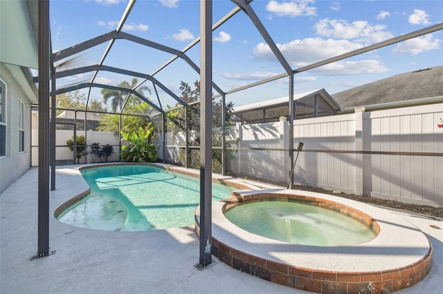 12304 Silton Peace Dr, Riverview, FL 33579 - view of pool with a patio area, a pool with connected hot tub, and a fenced backyard