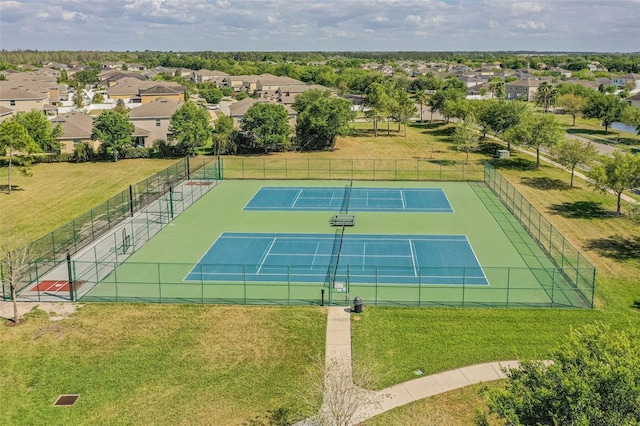 12304 Silton Peace Dr, Riverview, FL 33579 - view of tennis court featuring a yard, a residential view, and fence