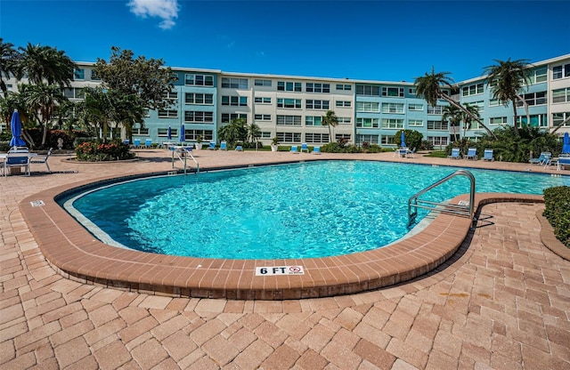 6201 2nd St E Unit 89, St Pete Beach, FL 33706 - community pool with a patio area