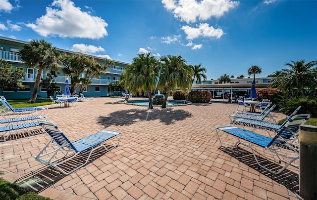 6201 2nd St E Unit 89, St Pete Beach, FL 33706 - view of home's community featuring a patio