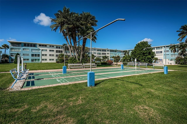 6201 2nd St E Unit 89, St Pete Beach, FL 33706 - surrounding community featuring shuffleboard and a yard