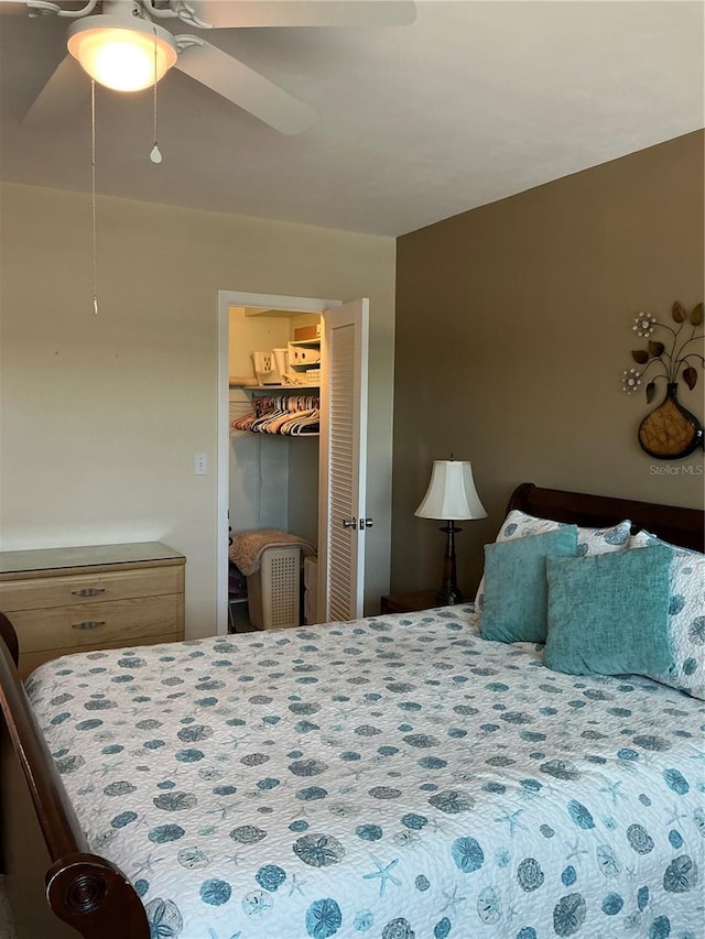 6201 2nd St E Unit 89, St Pete Beach, FL 33706 - bedroom with a spacious closet, a closet, and ceiling fan